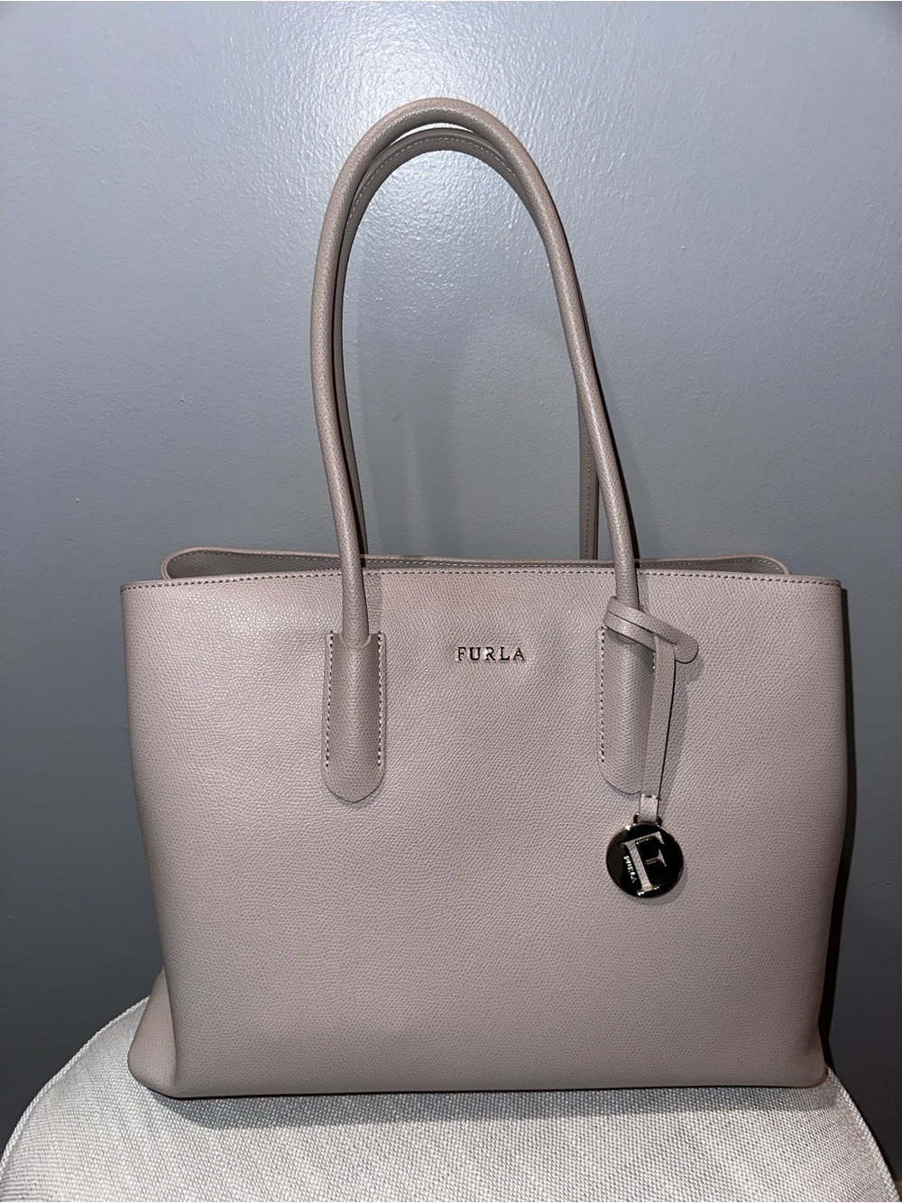 Furla Tessa large Leather Tote with Logo Charm in Greige, like new